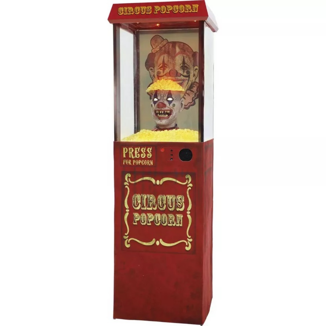 Fussel der Clown versteckt in der Popcornmaschine