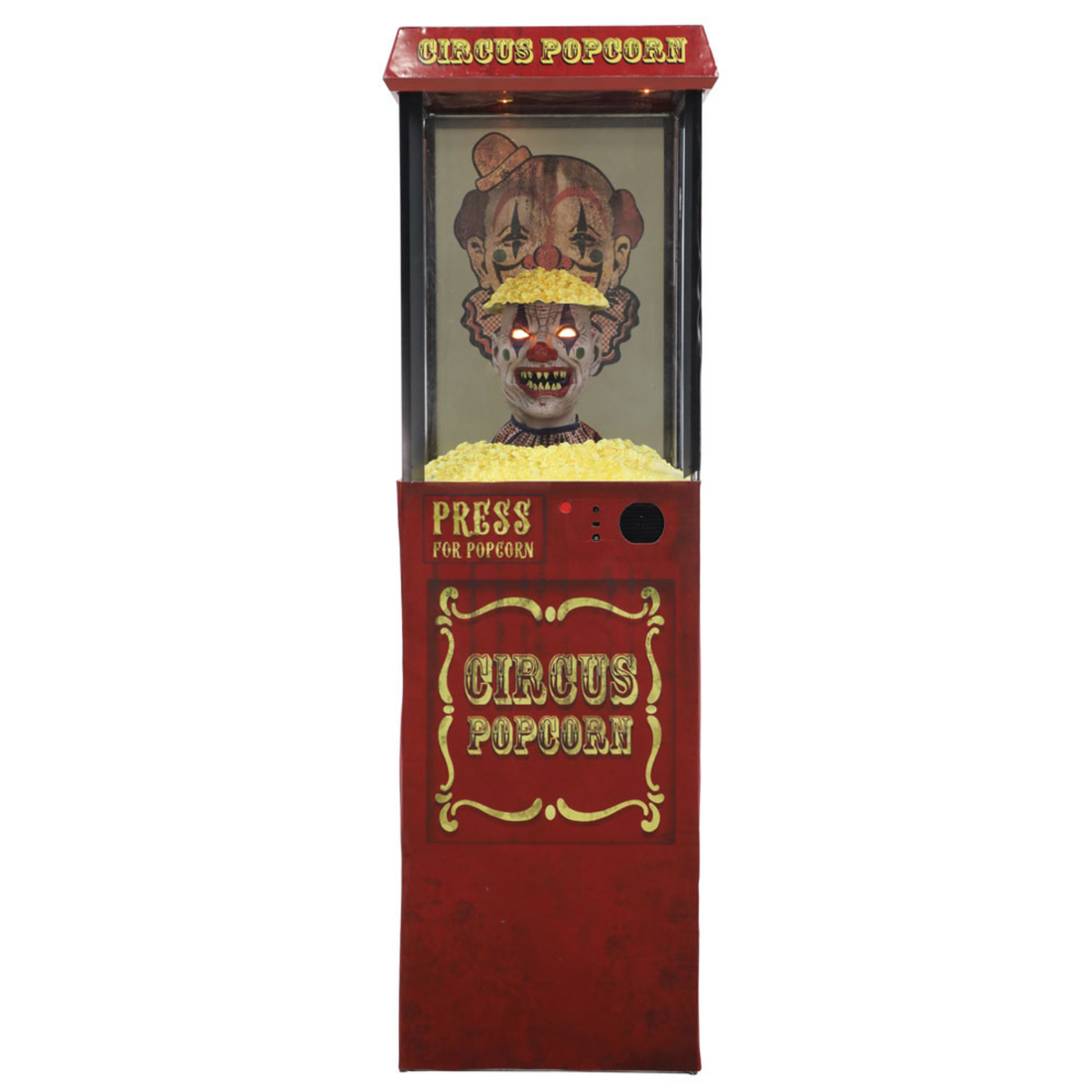 Fussel der Clown versteckt in der Popcornmaschine